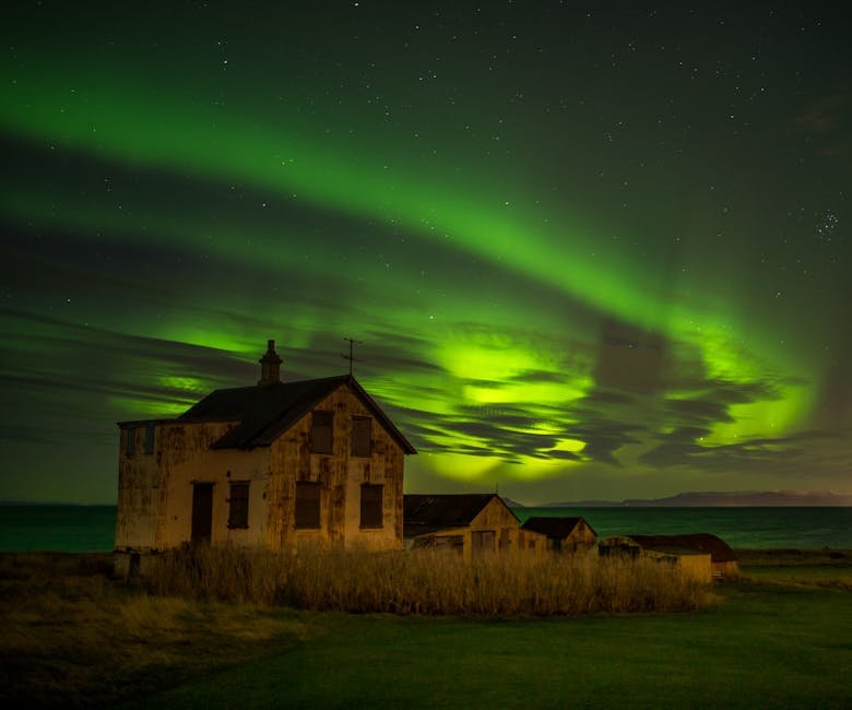 Cottage au bord de la mer sous les aurores boréales à Keflavik Islande
