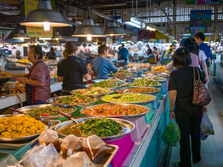 Stand de street food sur un marché nocturne à Bangkok en Thaïlande